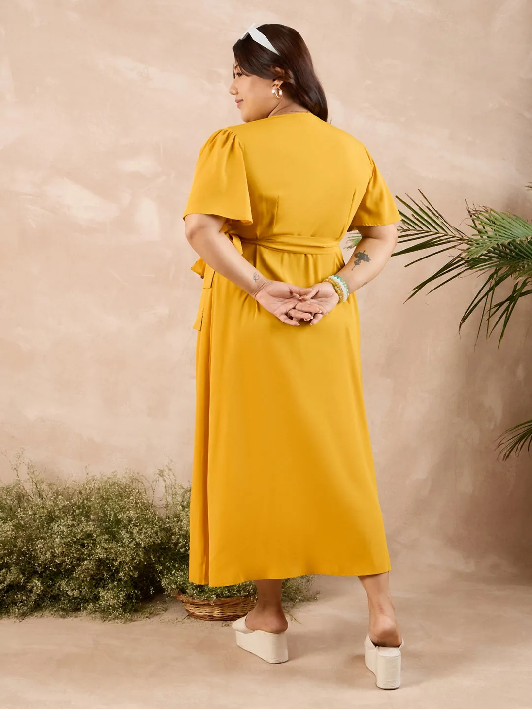 Berrylush Curve Women Solid Yellow V-Neck Flared Sleeves Tie-Up Waist Tulip Hem Wrap Maxi Dress